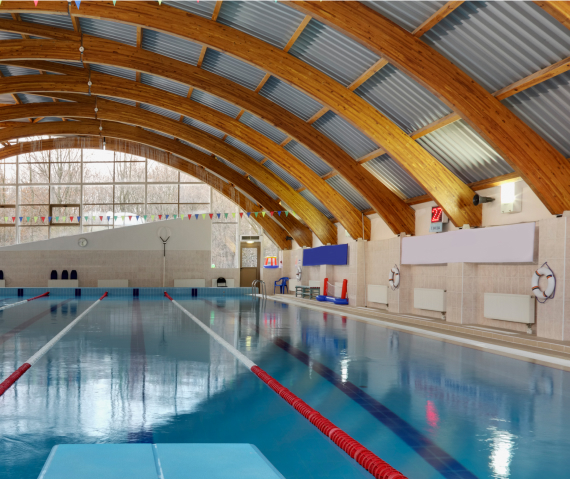 indoor-swimming-pool-with-marked-lanes-flat-calm-2022-03-04-02-32-52-utc 1